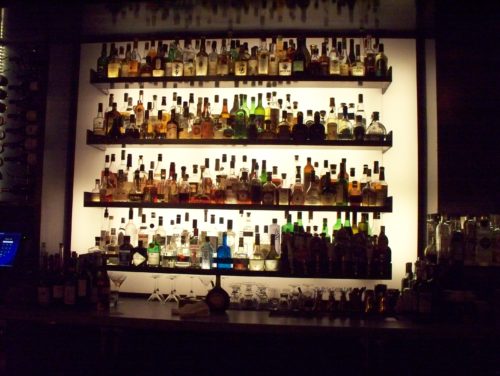 liquor_bottles_on_a_bar_wall
